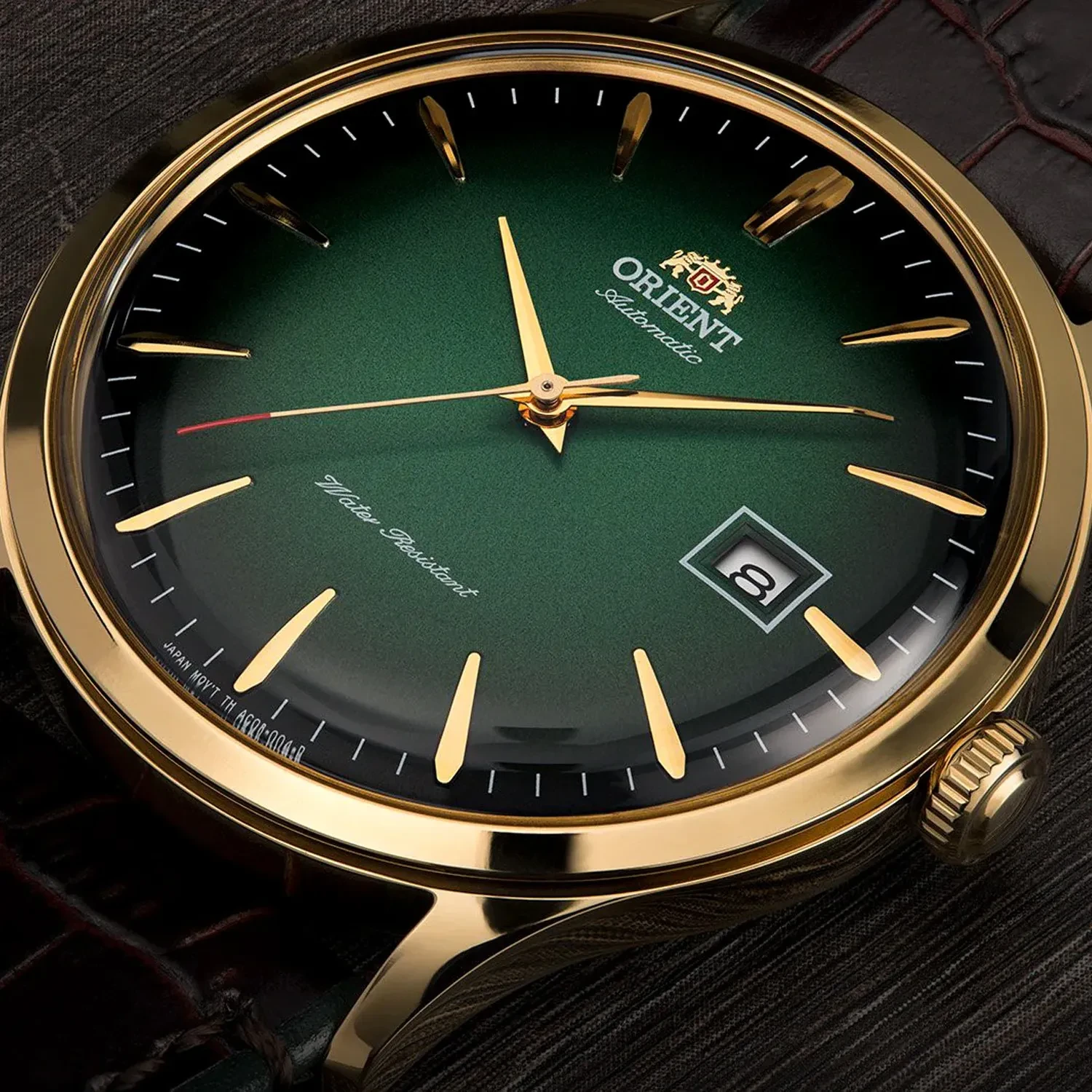 Orient Bambino Herrenuhr – Opalgrünes Zifferblatt, Automatikwerk, Lederarmband